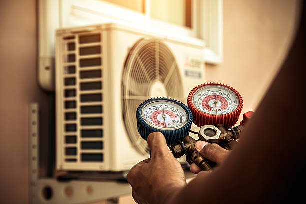 Professional Heat Pump Repair technician working in Buford, GA